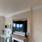example of plain plaster coving installed on media wall 