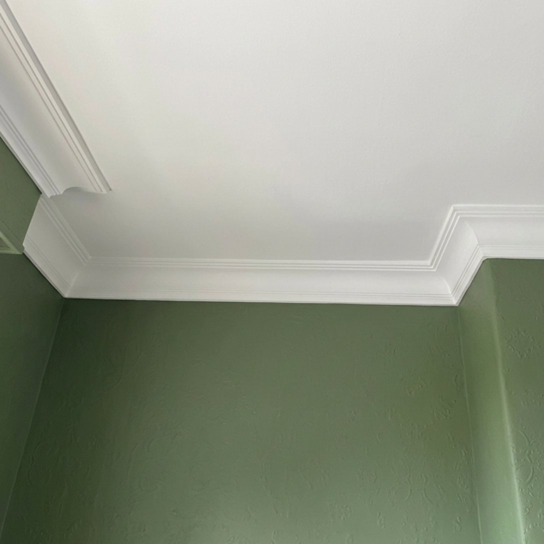 Regency coving installed around Chimney Breast