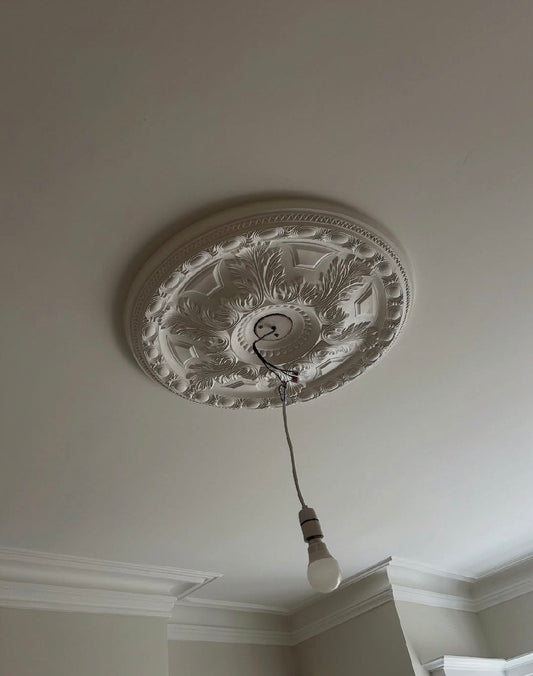 close up victorian floral plaster ceiling rose