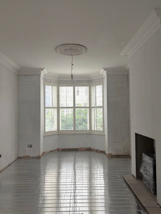 living room with victorian swan neck plaster coving