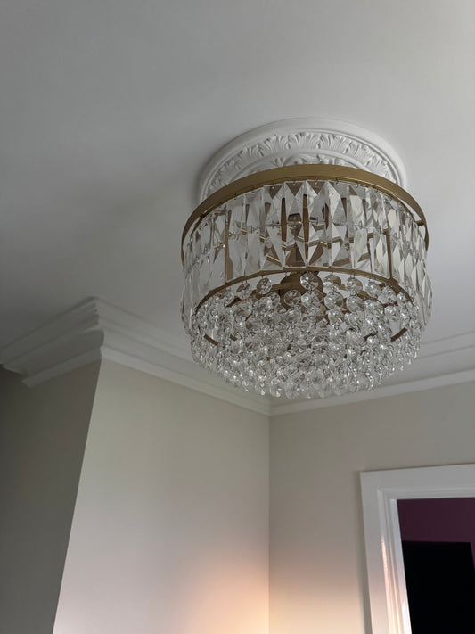 ornate victorian ceiling rose fitted in hallway