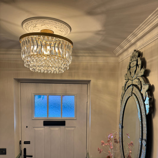small ornate ceiling rose fitted in hallway