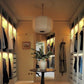 walk-in wardrobe framed by plaster coving