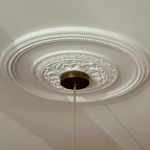 close up ornate plaster ceiling rose