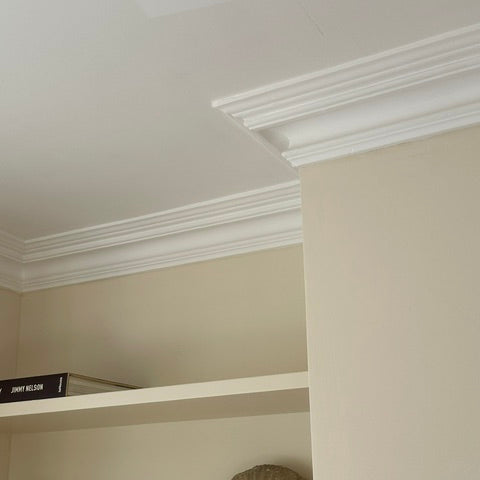 swan neck plaster cornice in living room