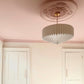 Close up of Colour Drenched Victorian Plaster Ceiling Rose