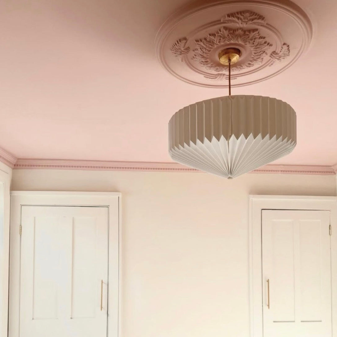 Close up of Colour Drenched Victorian Plaster Ceiling Rose