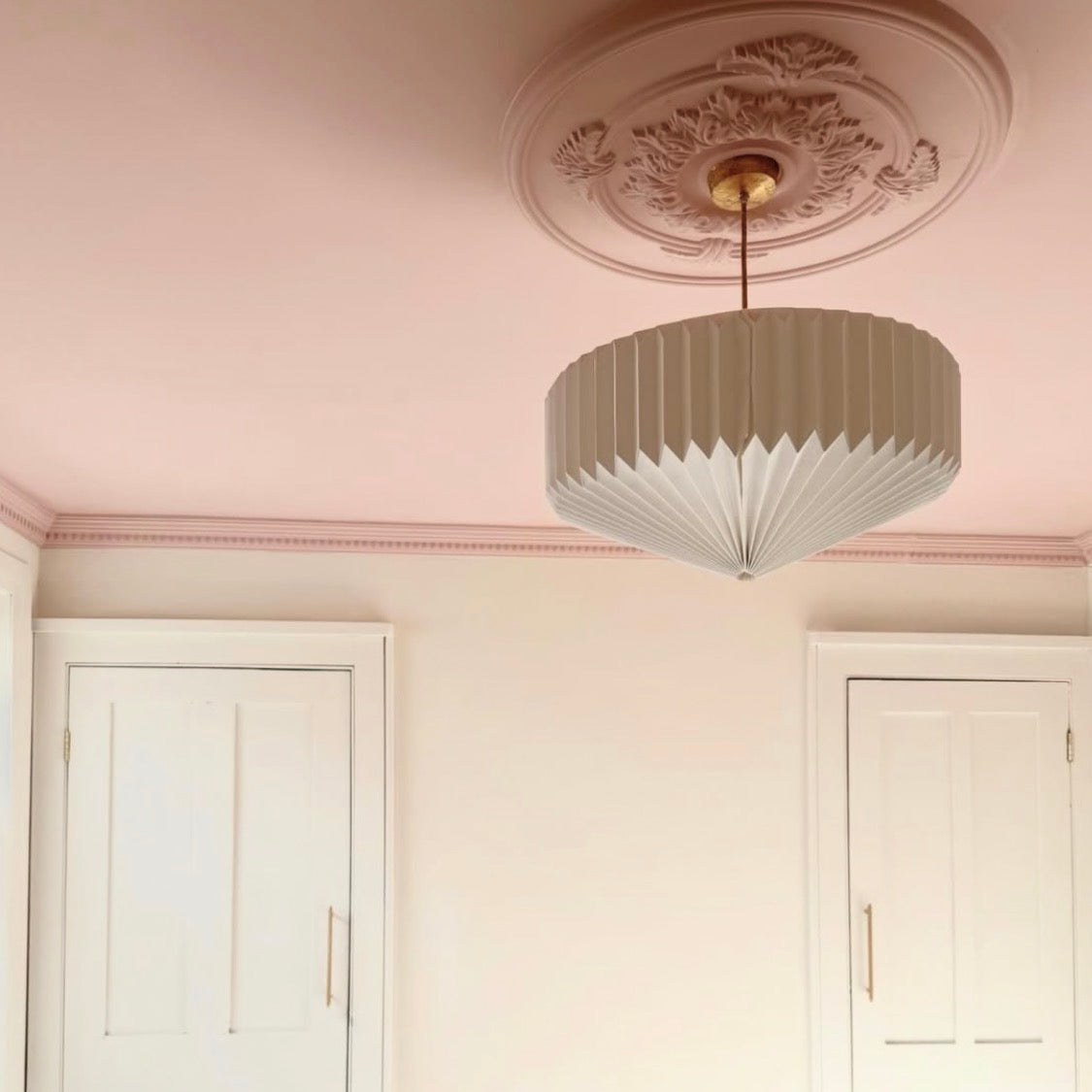 Close up of Colour Drenched Victorian Plaster Ceiling Rose
