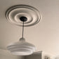 Example of Installed medium plain spun plaster ceiling rose. 