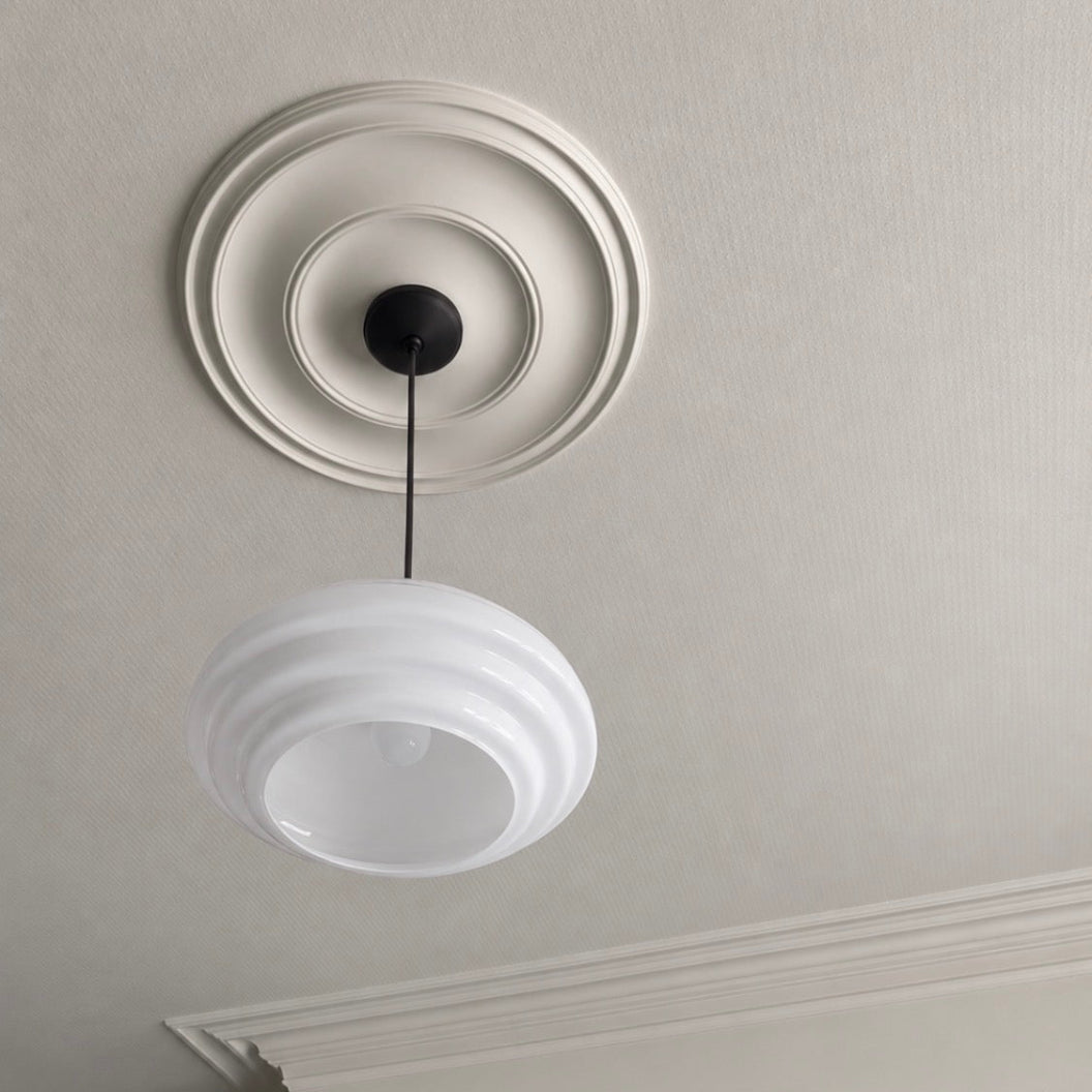 Close up of plain spun plaster ceiling rose. 