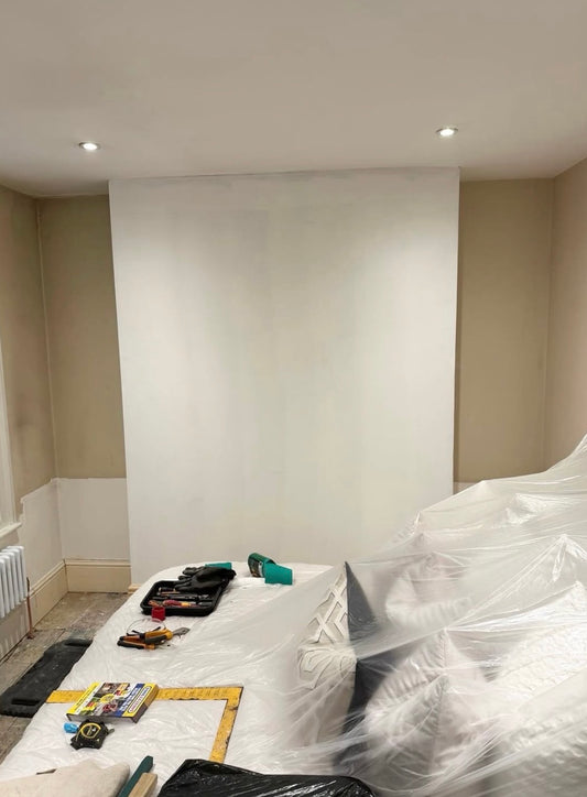 bedroom before coving and ceiling rose instillation project