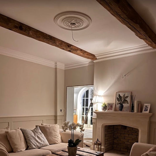 ornate victorian plaster ceiling rose fitted in living room