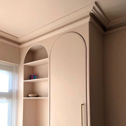 swan neck plaster cornice fitted in bedroom