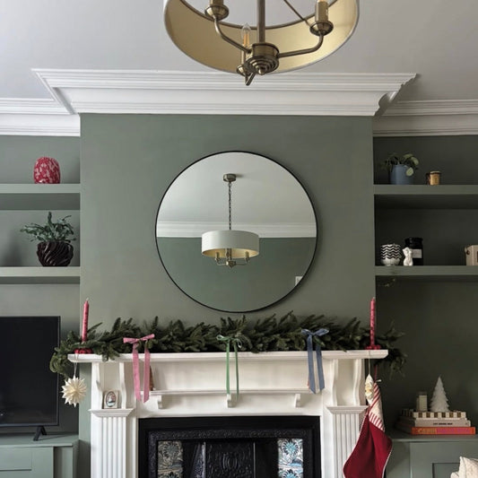 swan neck coving fitted in green living room