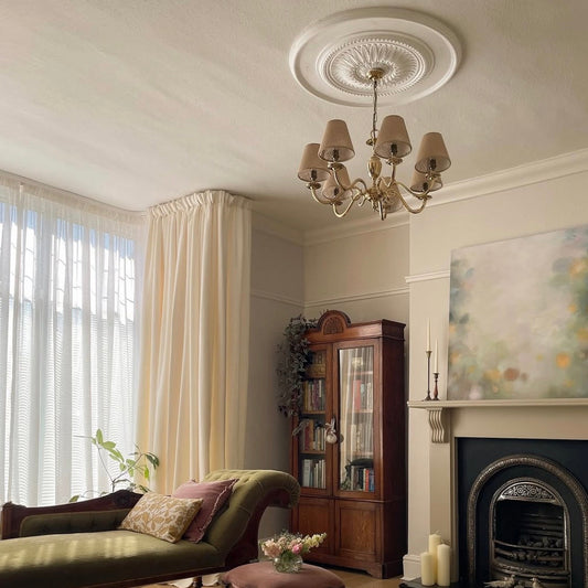 victorian ornate plaster ceiling rose in living room
