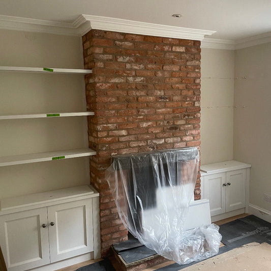 victorian swan neck plaster coving fitted on bare brick