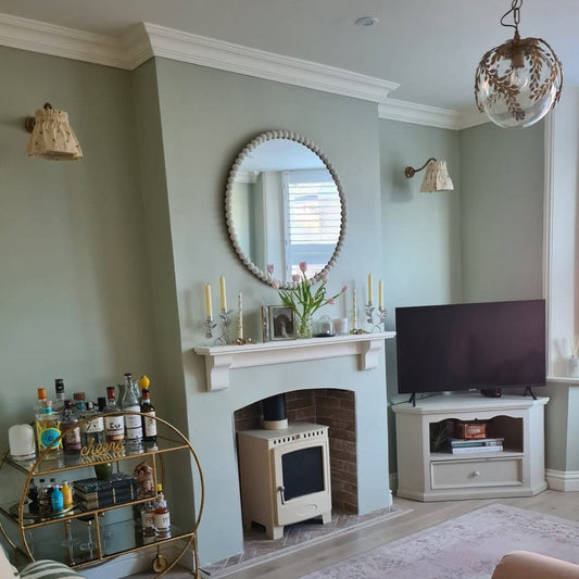 classic cornice fitted in green living room