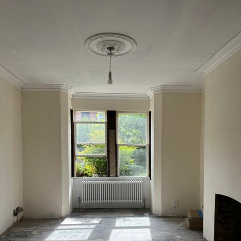 victorian plaster cornice and ceiling rose fitted in living room
