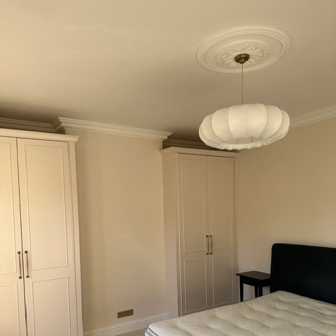 victorian ornate plaster ceiling rose in bedroom