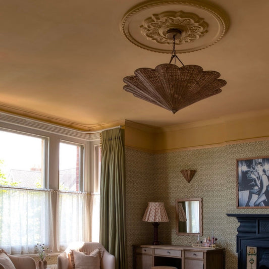 victorian ornate plaster ceiling rose in bedroom