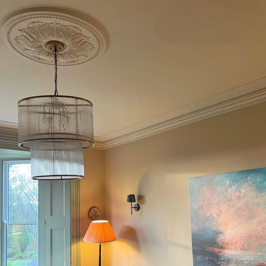 large victorian ceiling rose and chandler in living room