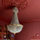 Victorian Ceiling rose drenched in deep red. 