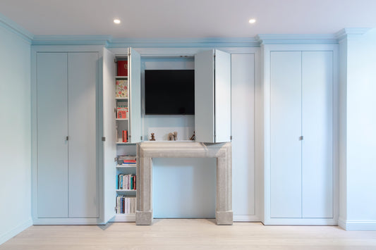 victorian swan neck plaster ceiling coving in living room painted blue