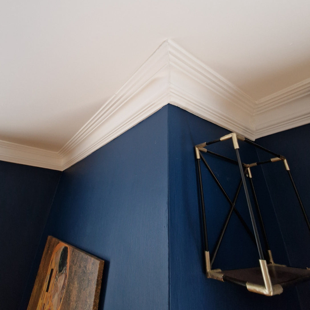 classic plaster cornice in blue room
