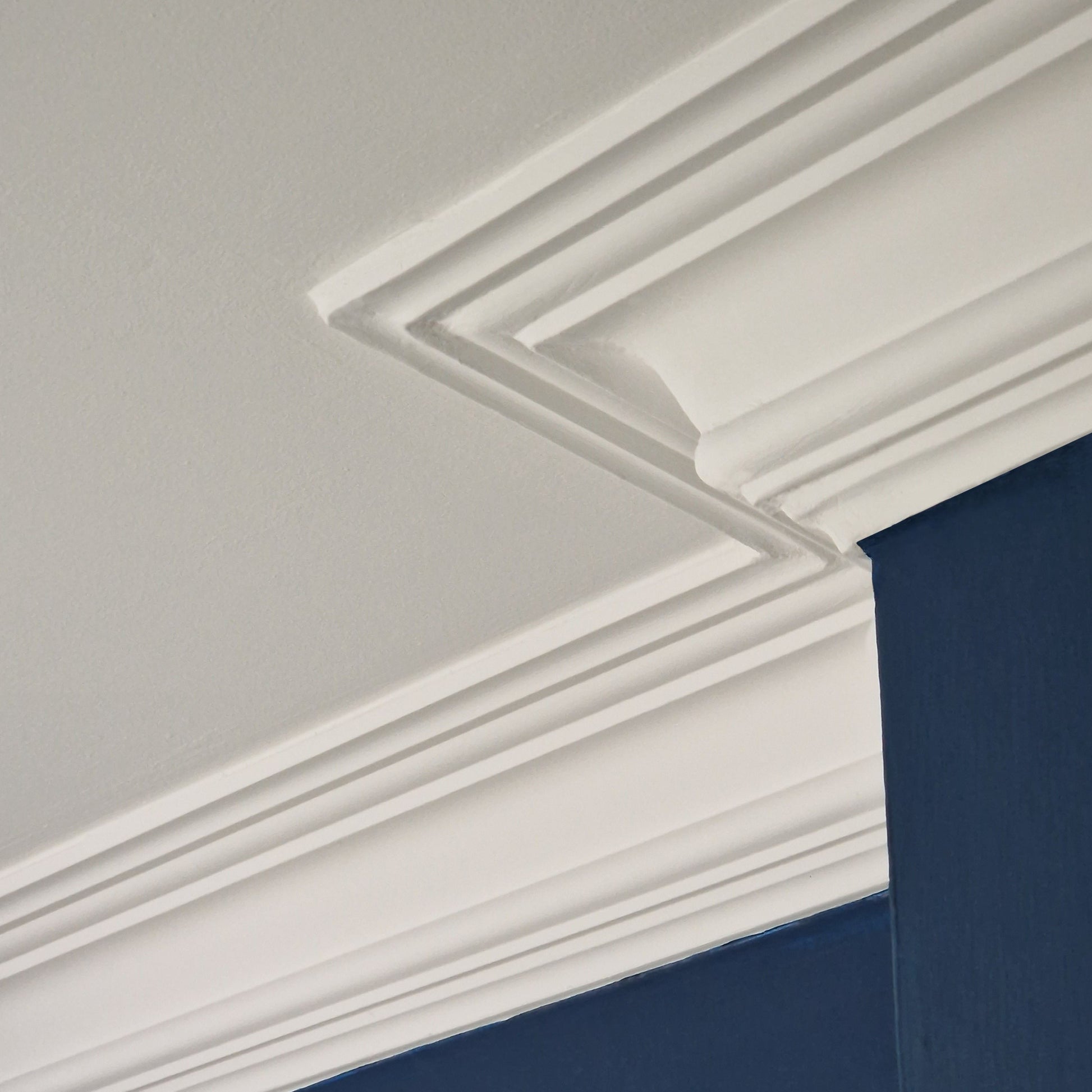mitre joint of victorian swan neck plaster coving