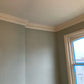 floral plaster cornice shown in green room