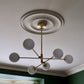 Plain spun plaster ceiling rose installed