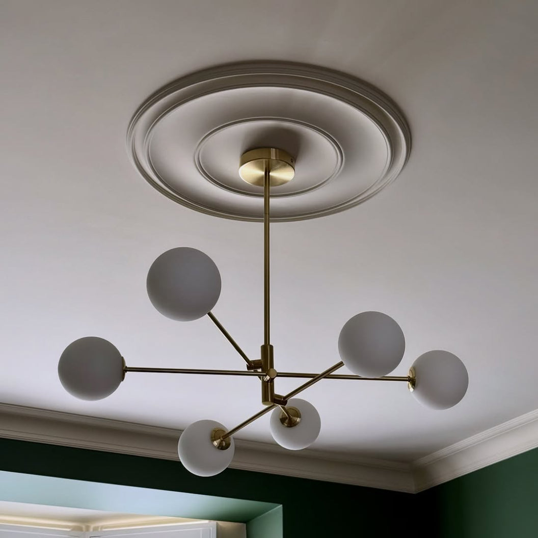 Plain spun plaster ceiling rose installed