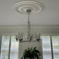 Plain Spun Plaster Ceiling Rose with Sleek Chandelier 