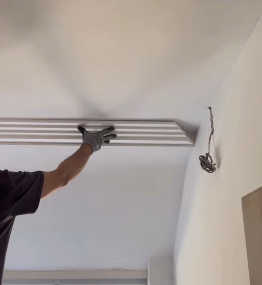 Art deco 4 step coving being fitted