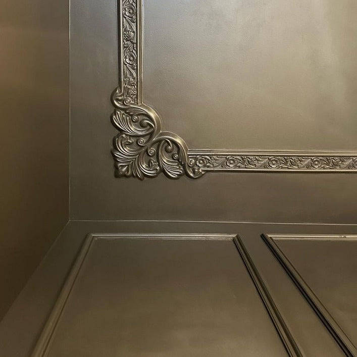 close up of decorative floral panel moulding corner 