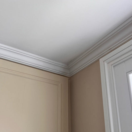victorian plaster coving shown fitted above window edge
