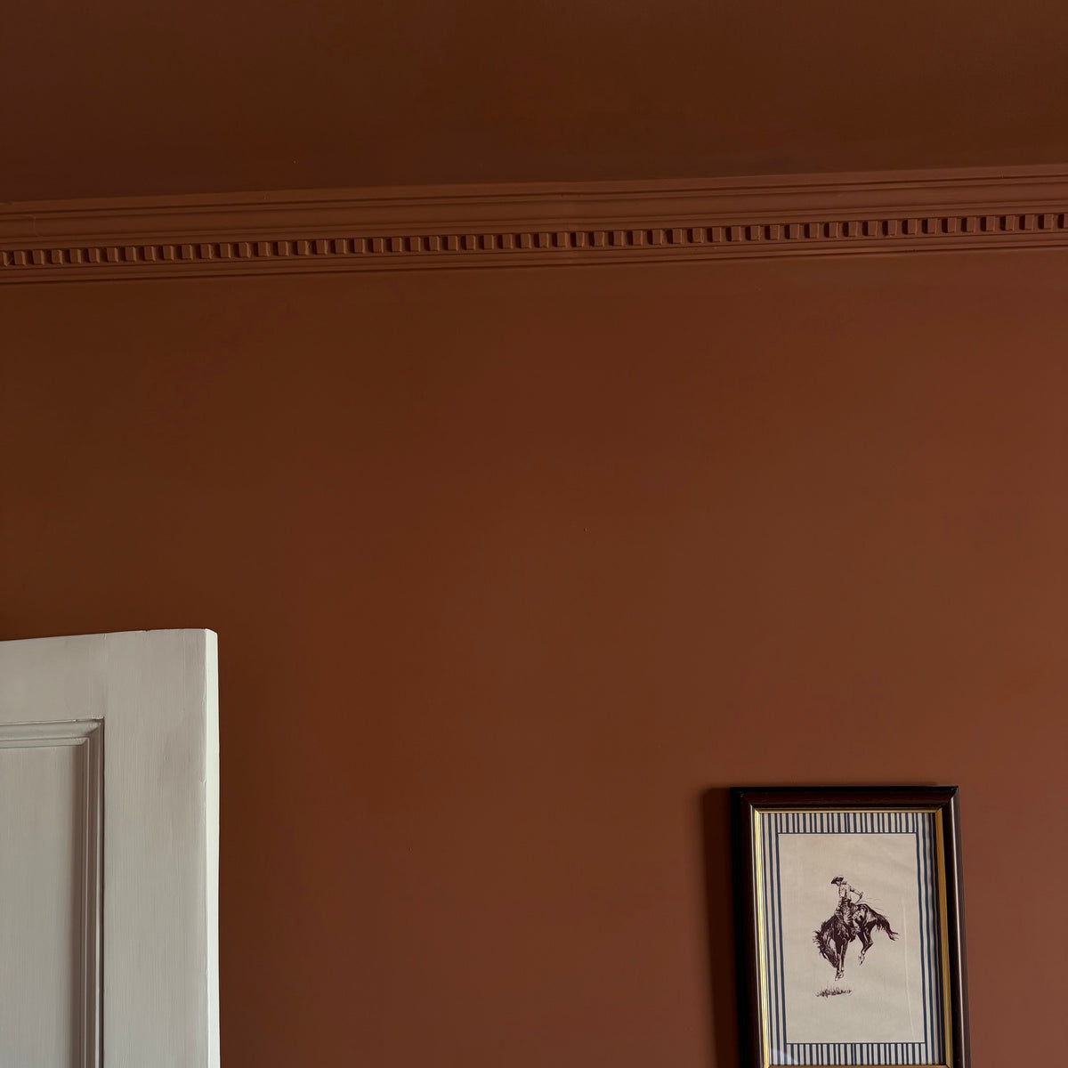 Dentil coving installed in dark room