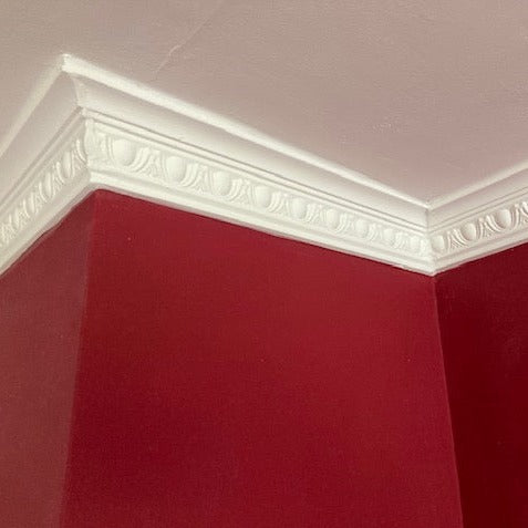 photo showing mitre joint of egg and dart plaster coving