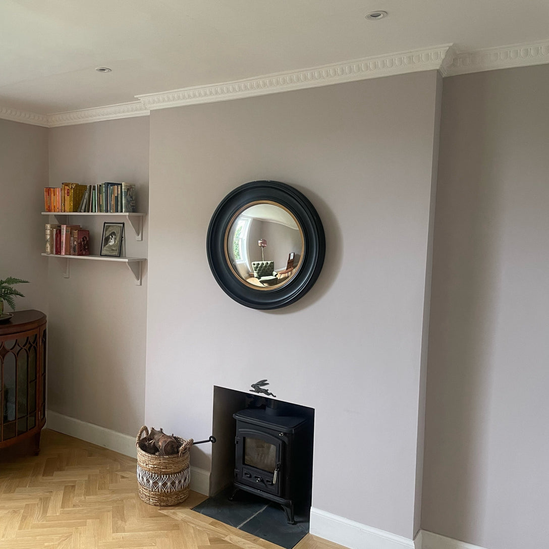 egg and dart plaster cornice shown in grey living room
