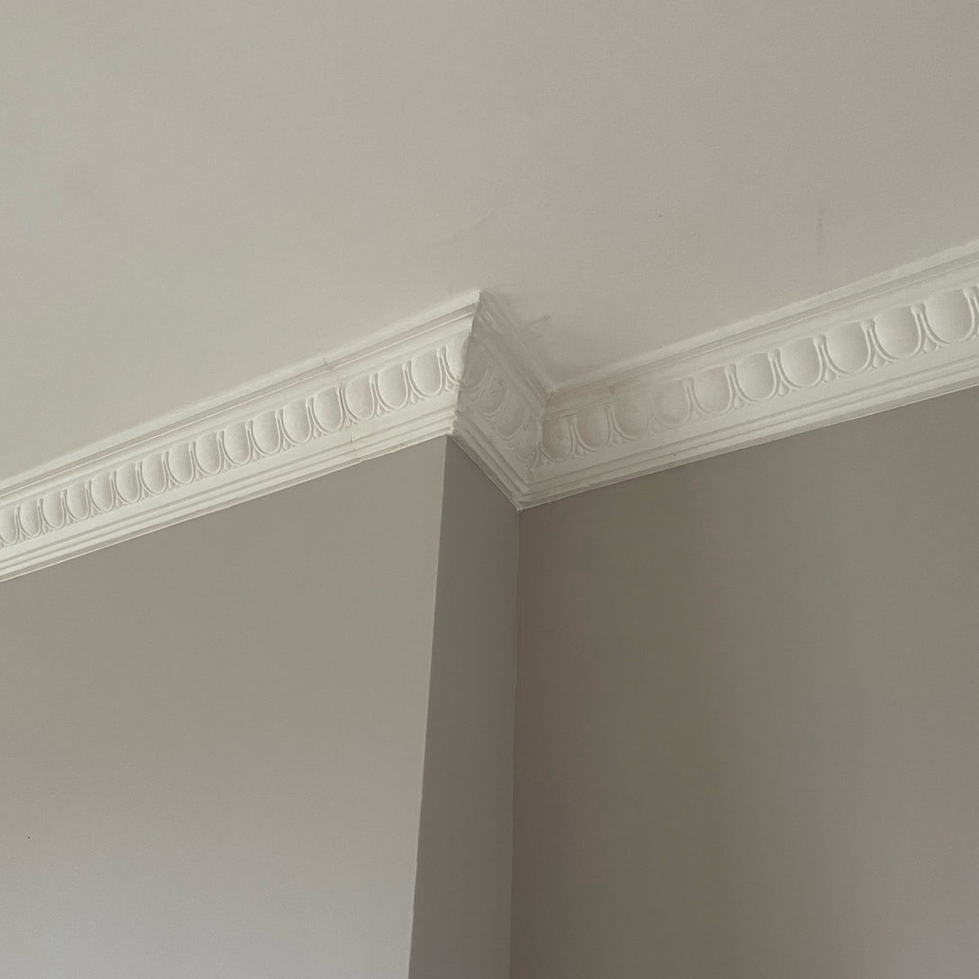 mitre joint of victorian egg and dart plaster cornice