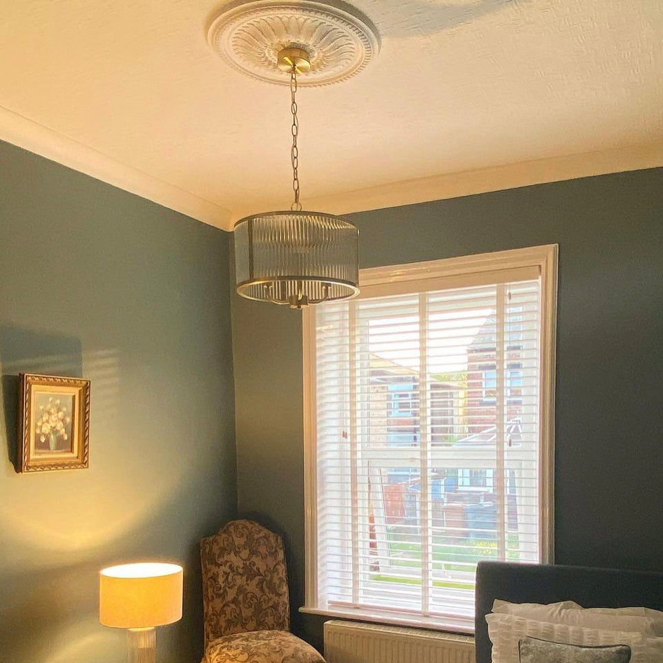 Sunflower Plaster Ceiling Rose in spare bedroom