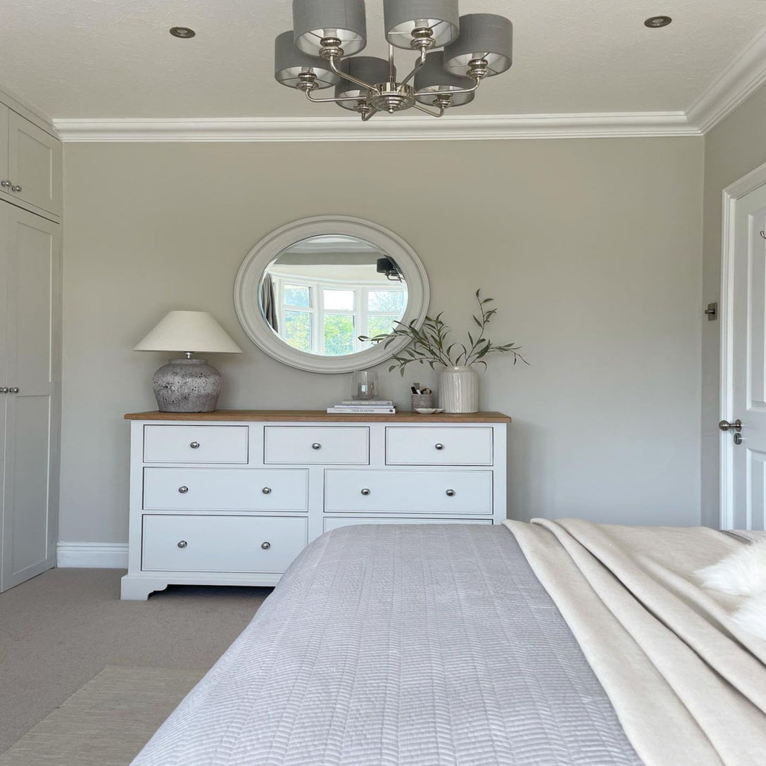 Ogee coving in naturally-lit bedroom