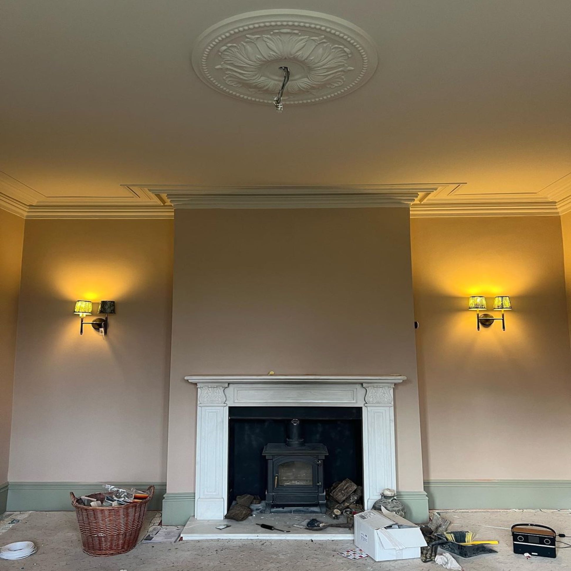 Ornate Floral Plaster Ceiling Rose in warm lighting