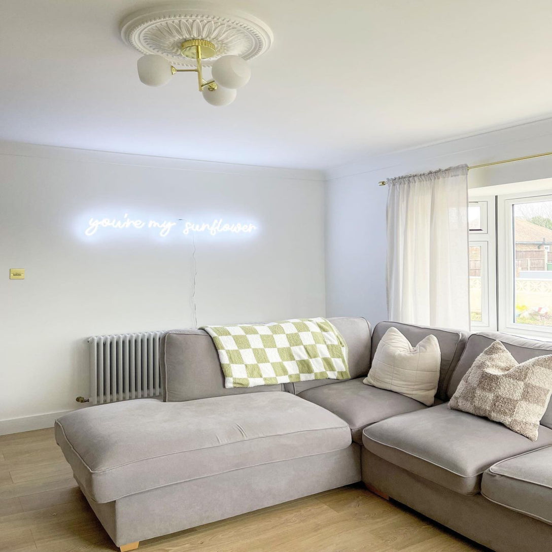 Sunflower Plaster Ceiling Rose in living room setting