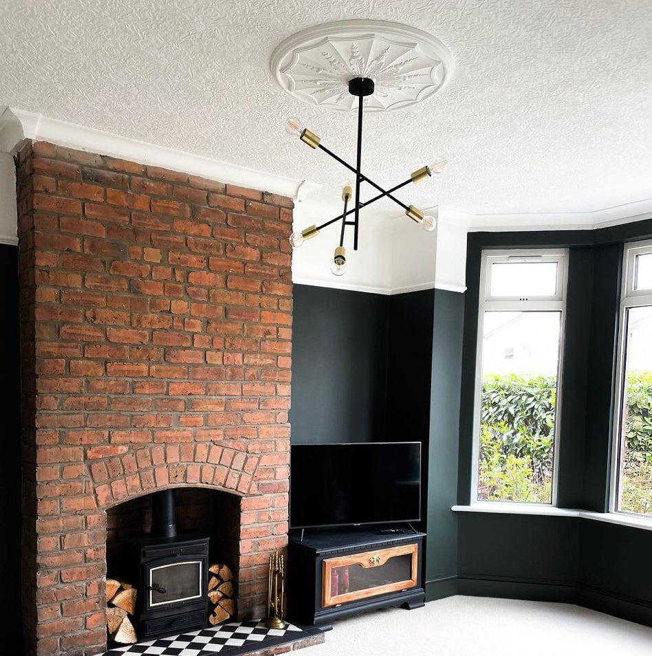 adams style plaster ceiling rose in cozy living room