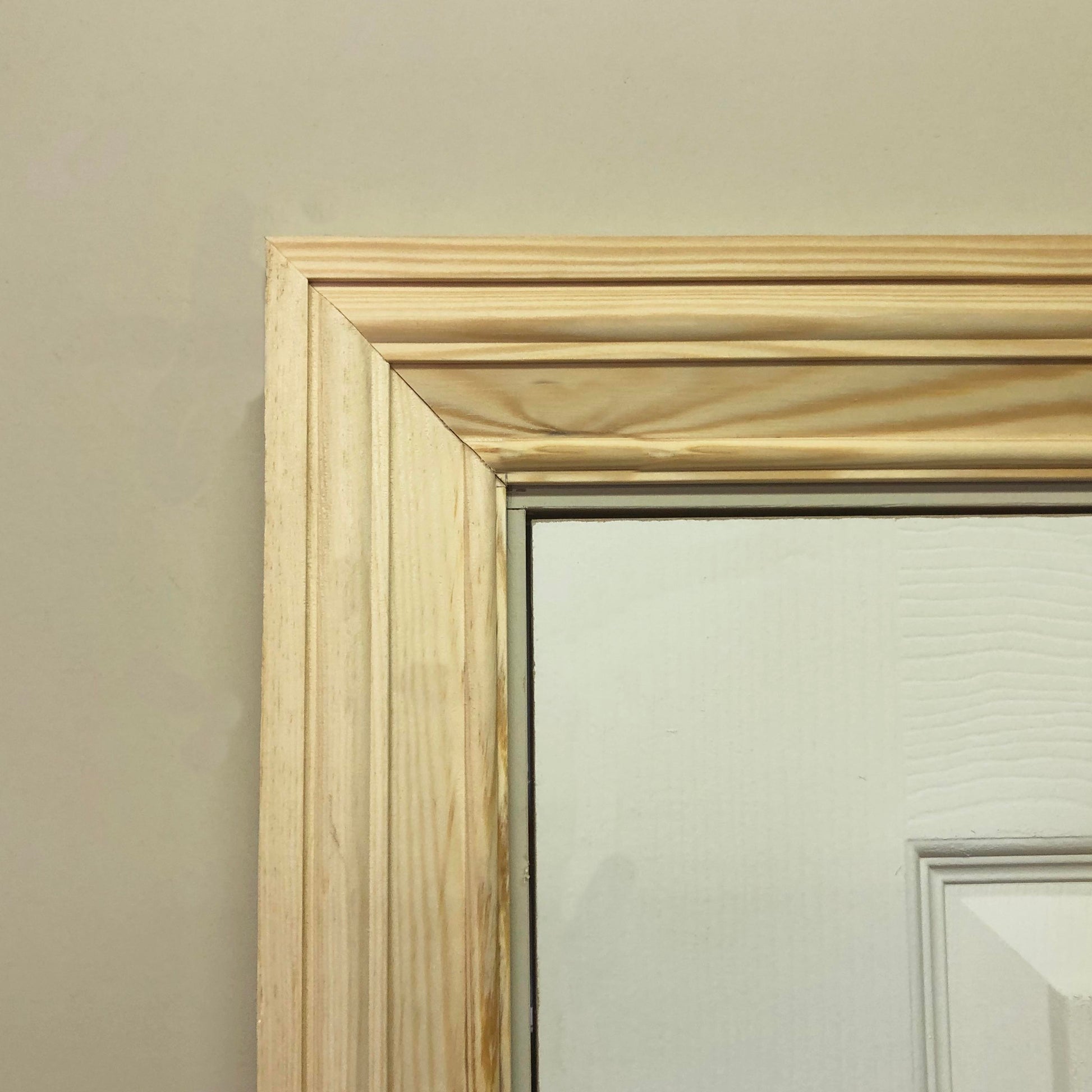 image shows a corner section of victorian ogee timber architrave