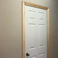 image shows a door finished with ogee timber victorian architrave