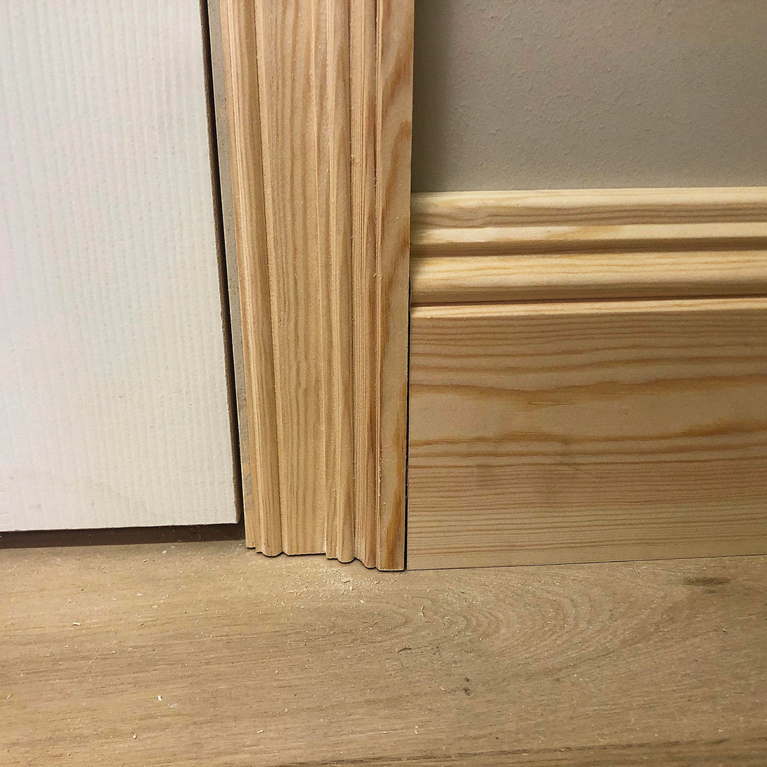 section of Victorian Timber Architrave next to skirting board - 69mm x 21mm 