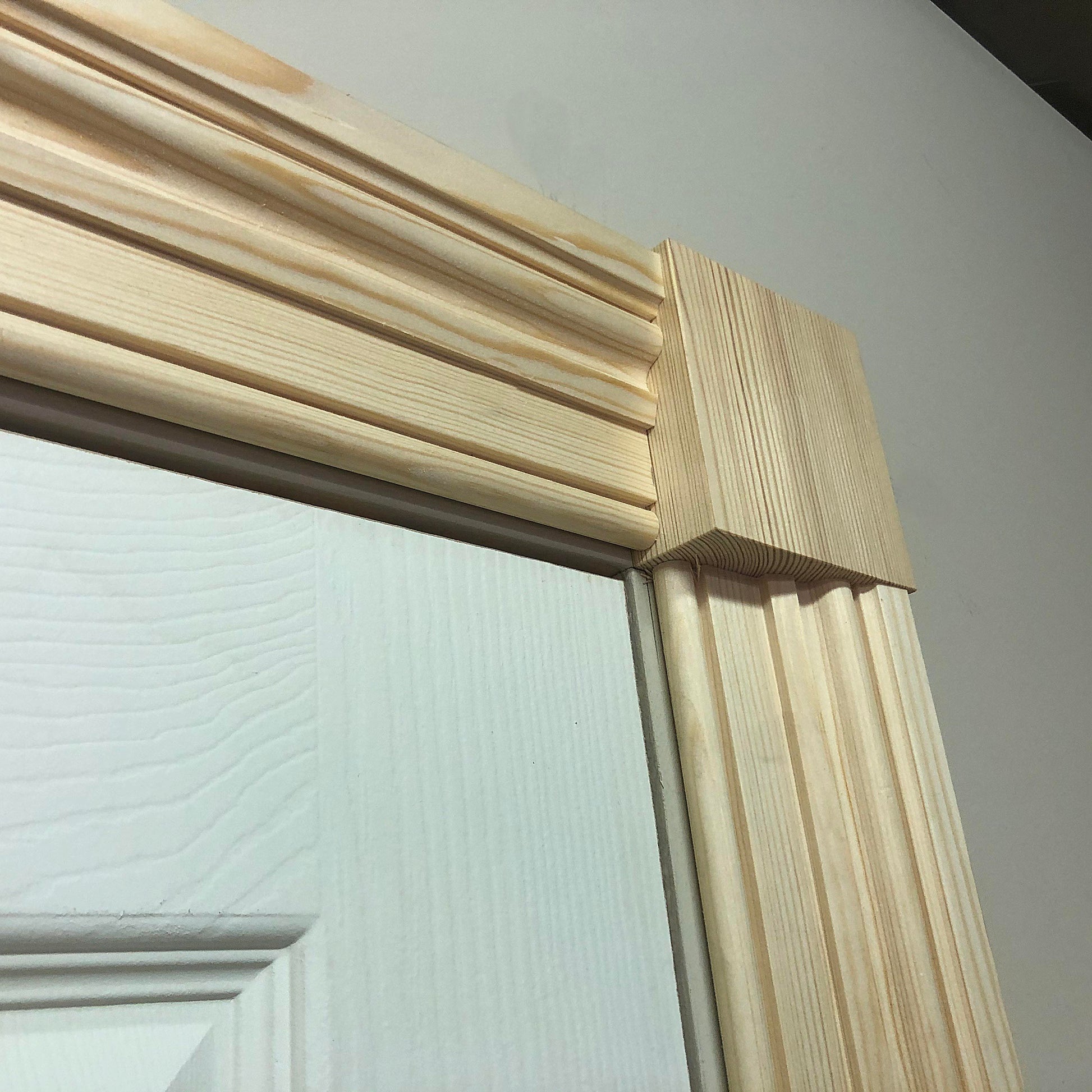detailed photo showing Victorian Timber Architrave with corner block 94mm x 28mm 