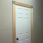 photo of fluted Victorian Timber Architrave fitted around a door - 91mm x 20mm 